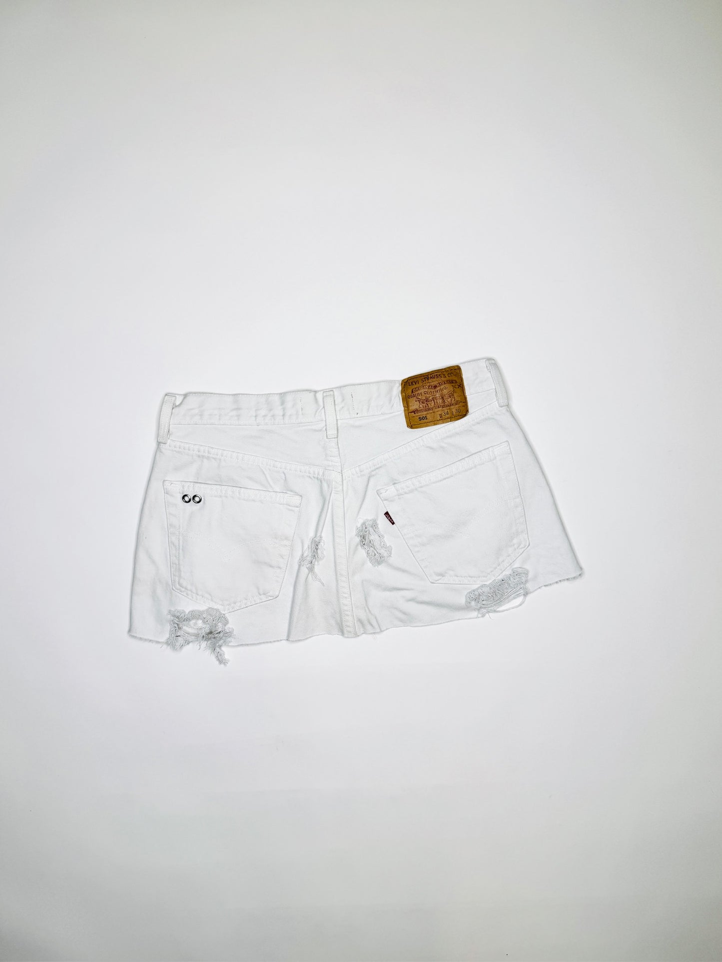 White Denim Pierced Mini Skirt